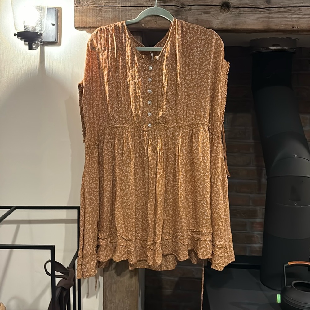 FREE PEOPLE smock dress. New w/tag never worn. Size small burnt orange pale pink